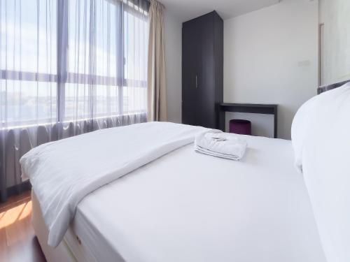 Кровать или кровати в номере I-City Luxury Condominiums, Shah Alam - Smarthome