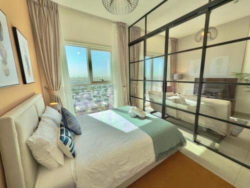 Postel nebo postele na pokoji v ubytování Modern flat in Dubai Hills
