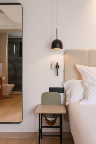 Ένα ή περισσότερα κρεβάτια σε δωμάτιο στο Hostal Marí