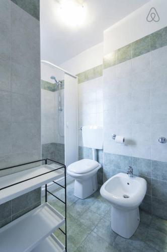 a bathroom with a sink and a toilet and a shower at Cà Borgo Vecchio in Brusasco