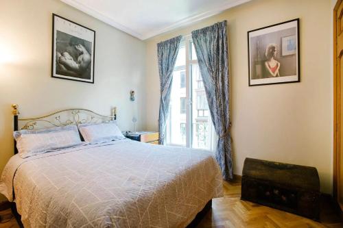 Posteľ alebo postele v izbe v ubytovaní Modern apartment in Donostia, 75 m² with jacuzzi.