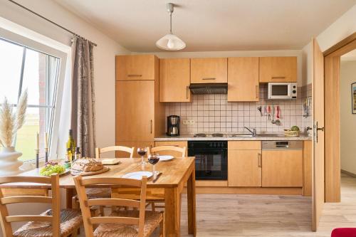 Dapur atau dapur kecil di Traberhof - Landurlaub in seiner schönsten Form - freies Reiten inbegriffen - Hunde willkommen - Sauna im Haus - Kanuverleih - tolle Radwege - Deich in Sichtweite