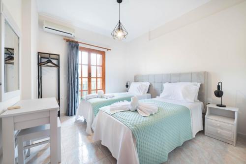 Mani Villa Iliasにあるベッド