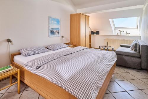 Katil atau katil-katil dalam bilik di Traberhof - Landurlaub in seiner schönsten Form - freies Reiten inbegriffen - Hunde willkommen - Sauna im Haus - Kanuverleih - tolle Radwege - Deich in Sichtweite