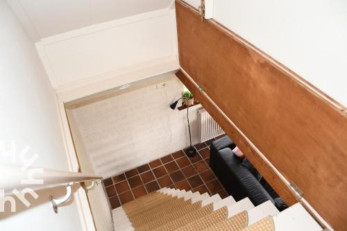 an overhead view of a staircase in a room at OV606 - Beautifully located 6-person holiday home by the water with a large garden in Ossenzijl in Ossenzijl