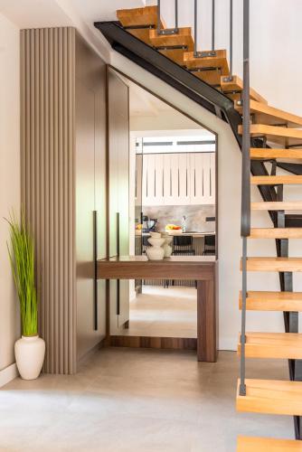 a staircase in a room with a stair case at Holiday home in Supetar in Supetar