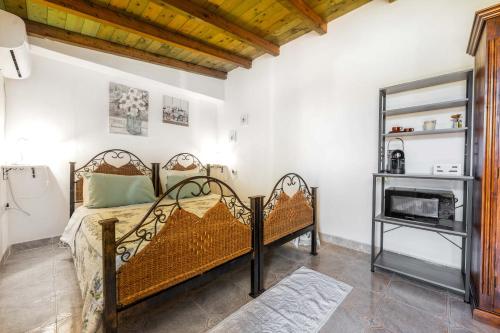 Ένα ή περισσότερα κρεβάτια σε δωμάτιο στο Monolocale Melograno