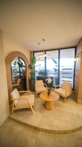 Χώρος καθιστικού στο Heritage by Cimen Hotel