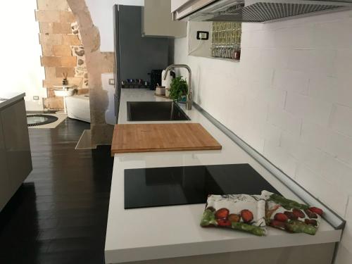 A kitchen or kitchenette at Le Cinque Pietre