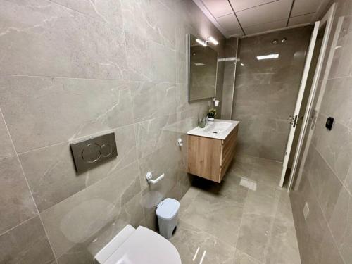 Apartment near Playa de Cura with a rooftop swimming pool