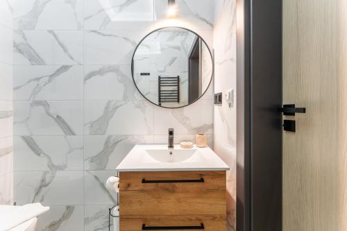 Ένα μπάνιο στο Silver Apartamenty
