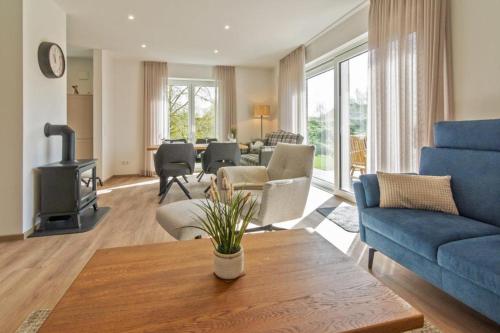 Posezení v ubytování Ferienhaus Lüttje Steern 5 Sterne