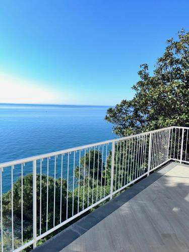 a balcony with a view of the ocean at L'Íle D'Azur in Arenzano