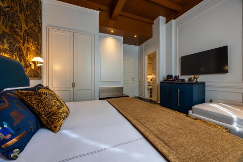 Ένα ή περισσότερα κρεβάτια σε δωμάτιο στο HT6 Hotel Roma