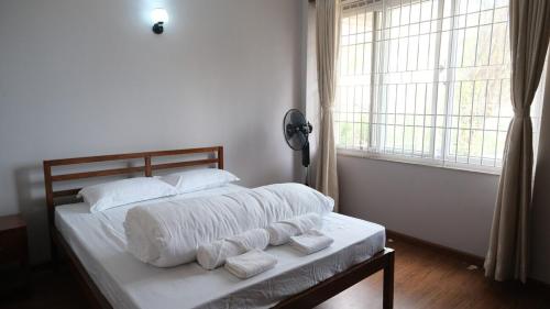 Llit o llits en una habitació de Casa Nina