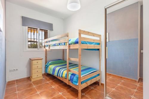 Postel nebo postele na pokoji v ubytování Chalet El Olivo