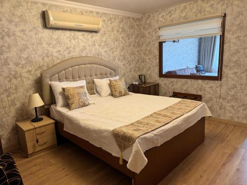 Postel nebo postele na pokoji v ubytování Hotel Ipekyolu