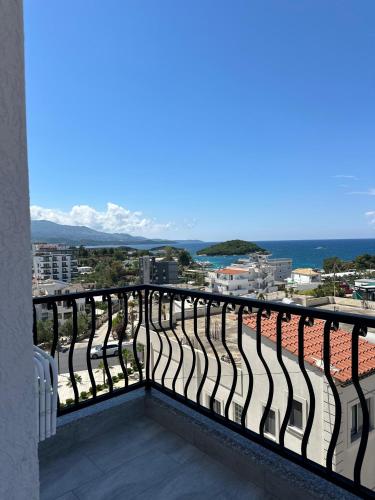 a balcony with a view of a city at Avenue Hotel in Ksamil