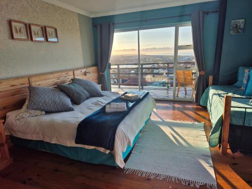 Katil atau katil-katil dalam bilik di Bluebottle Guesthouse