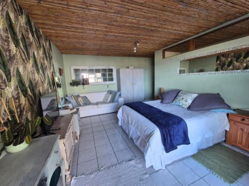 Katil atau katil-katil dalam bilik di Bluebottle Guesthouse