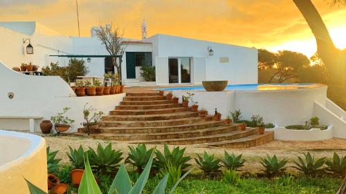 a set of stairs in front of a house at Casa da Ingrina in Raposeira
