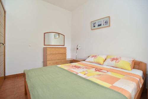 Ένα ή περισσότερα κρεβάτια σε δωμάτιο στο Blue Mare Apartment