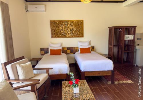 Cama o camas de una habitación en BIRA Hotel