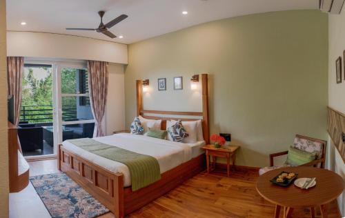 Una cama o camas en una habitación de The Golden Tusk By Ivory Destinations