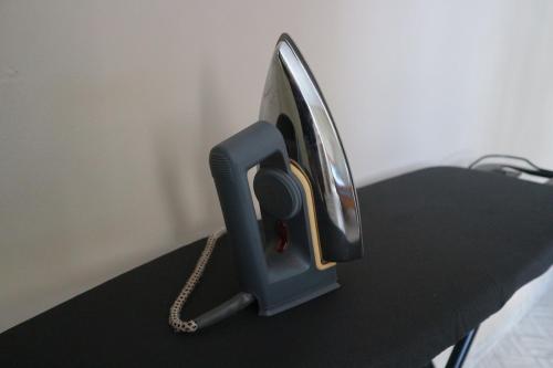 a telephone sitting on top of a table at The Urban Oasis Ntinda in Nalakonge