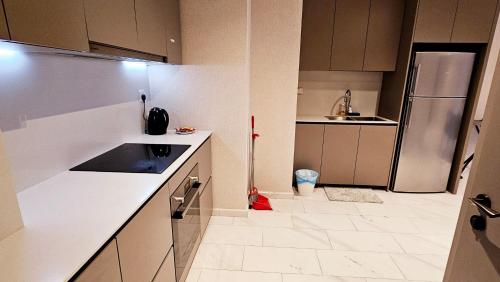 Cucina o angolo cottura di Crystal Service Suite At Eaton KLCC