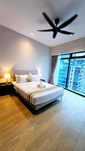 Letto o letti in una camera di Crystal Service Suite At Eaton KLCC