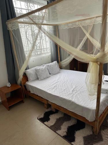 Katil atau katil-katil dalam bilik di Stay with Merina