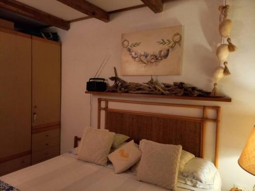 Postel nebo postele na pokoji v ubytování Via Ulisse - FBU-URB01