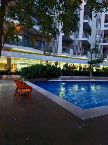 Bazén v ubytování Tambuli Shore Residence nebo v jeho okolí