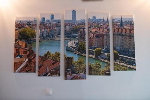 Cette chambre offre une vue sur la ville de Berlin. dans l'établissement Soyeux - Superbe canut quai de Saône, à Lyon