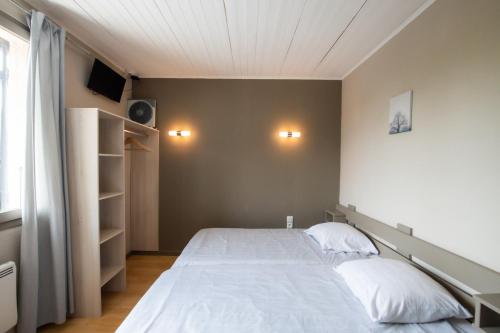 Katil atau katil-katil dalam bilik di Chez Jostel - Chambre 5