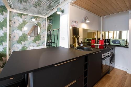 Le Canopée - Beau studio atypique quais du Rhône