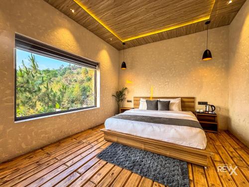 Postel nebo postele na pokoji v ubytování Anupraas Resort