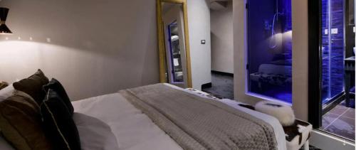 Ένα ή περισσότερα κρεβάτια σε δωμάτιο στο HT6 Hotel Roma