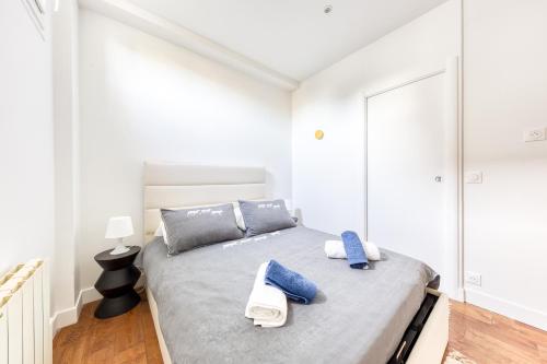 En eller flere senge i et værelse på Le Sympathique - Metro 7 à 4 minutes - Direction Paris