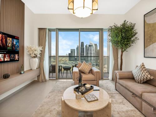 Un lugar para sentarse en Burj Khalifa View Infinity Pool Walk to Dubai Mall