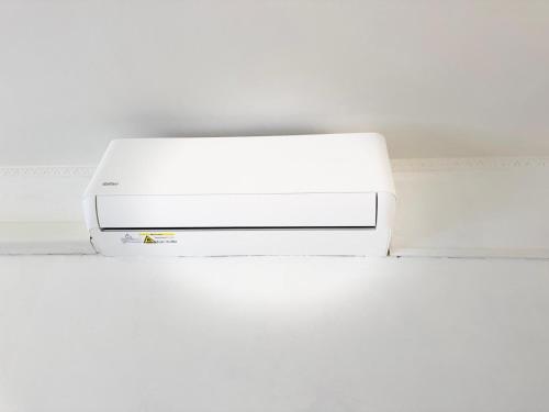 a white printer sitting on top of a table at Dream Stay Nettuno in Nettuno