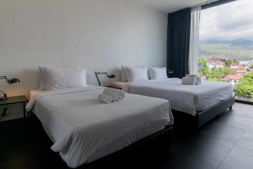 Postel nebo postele na pokoji v ubytování BED Changkian - Adults Only