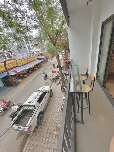 a car parked on the side of a balcony at Happy Home - Big Balcony - Best Location in Hanoi
