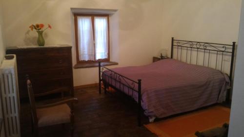 Postel nebo postele na pokoji v ubytování Agriturismo Cordiglianello