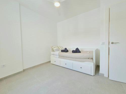 Postel nebo postele na pokoji v ubytování BHost - Los Patos