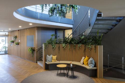 Posezení v ubytování JUFA Hotel Wangen im Allgäu