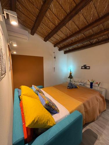 Ένα ή περισσότερα κρεβάτια σε δωμάτιο στο Borgo Bortolone