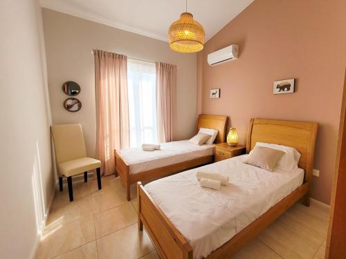 Ένα ή περισσότερα κρεβάτια σε δωμάτιο στο Large comfortable 2 bedroom apartment 200Mbps WiFi