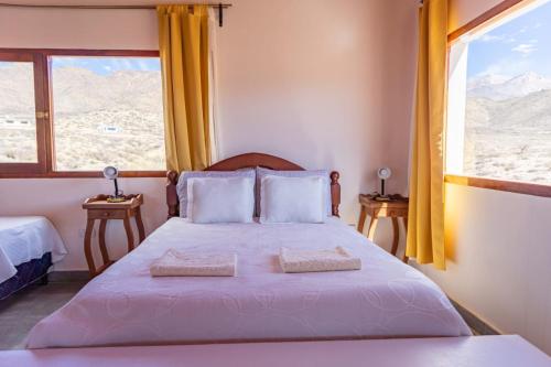 Postel nebo postele na pokoji v ubytování Cabaña Puertas del Cielo